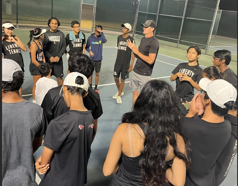 Tennis+takes+on+Lebanon+Trail+Thursday+in+a+tournament+match+up+away.+%E2%80%9CWe+want+to+work+together+as+a+team+and+communicate+better%2C%E2%80%9D+junior+Anya+Krishna+said.